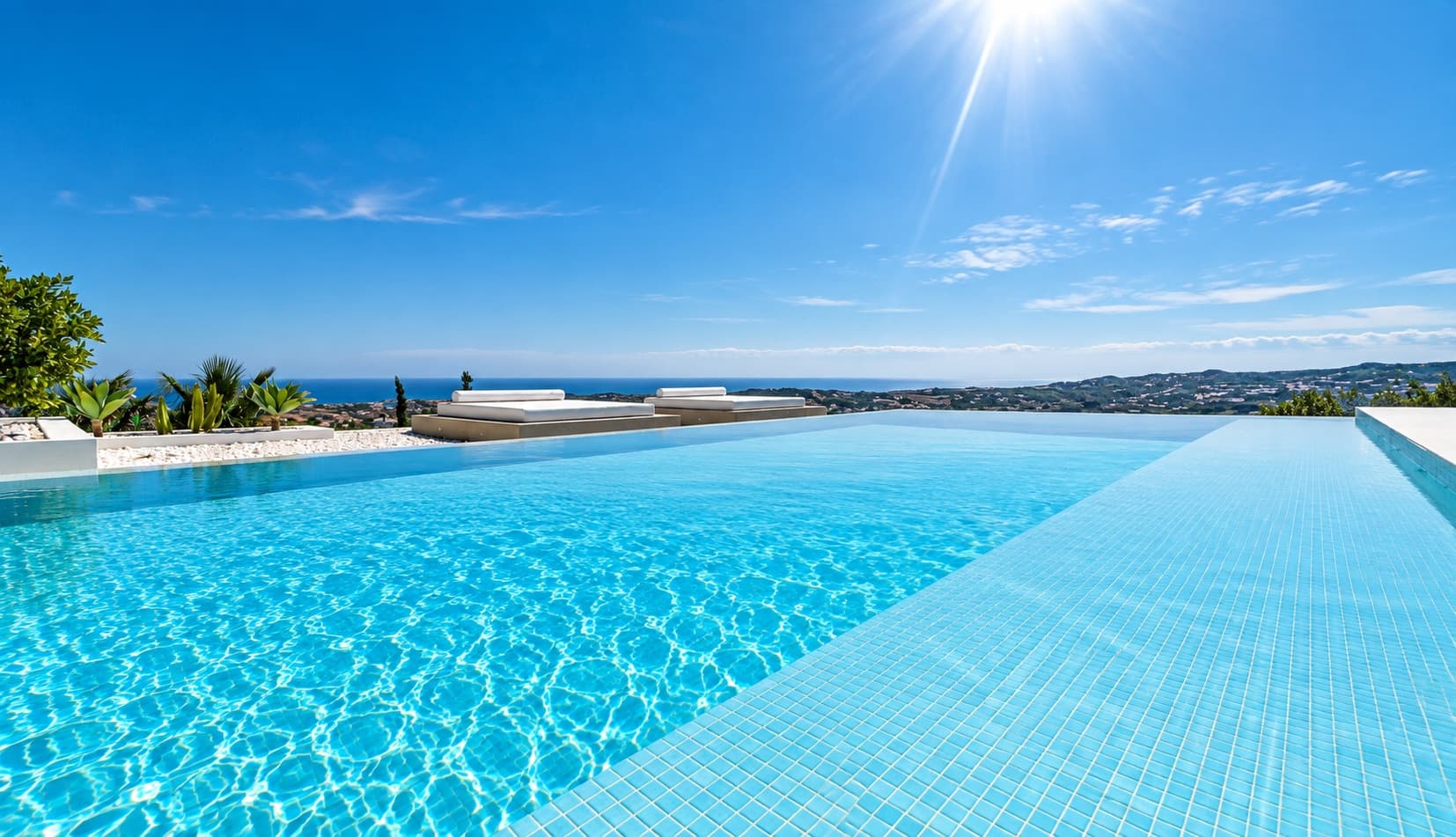 Panoramic Mediterranean views from the infinity pool