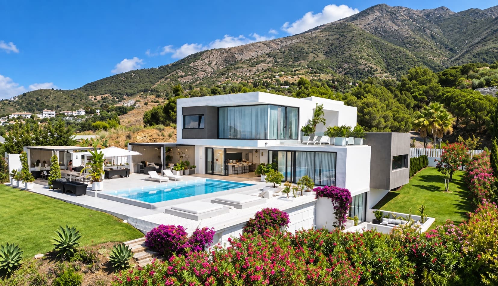 Aerial view of Villa Los Pichies surrounded by the Sierra de Mijas